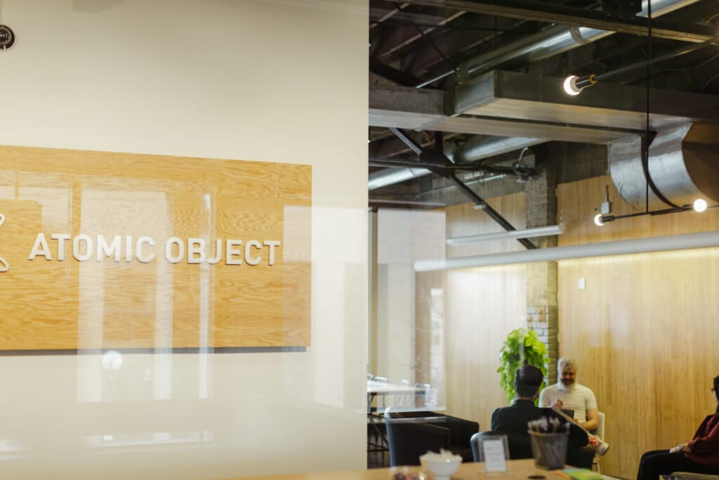 Pictured is the interior of the Atomic Object Ann Arbor office. Post title: How to Tell If a Company's Culture Is Real Before You Accept the Offer