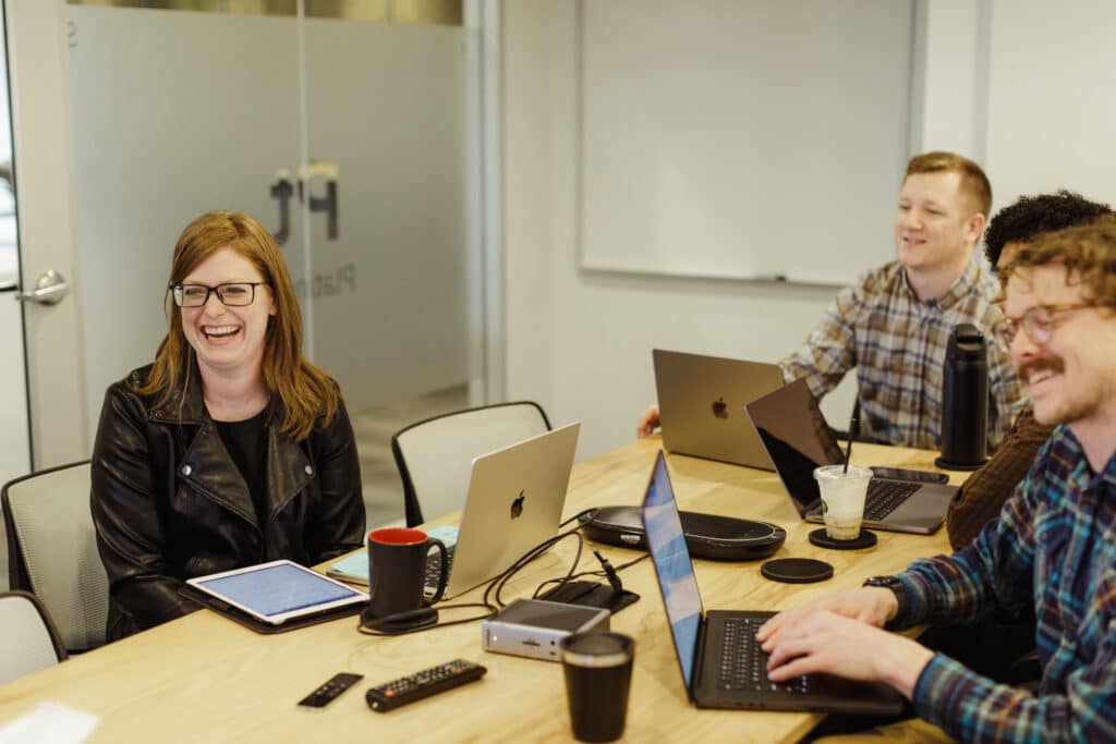 Author Jared Surato with coworkers. Post title: "Cheaper" Code Makes Creativity More Valuable
