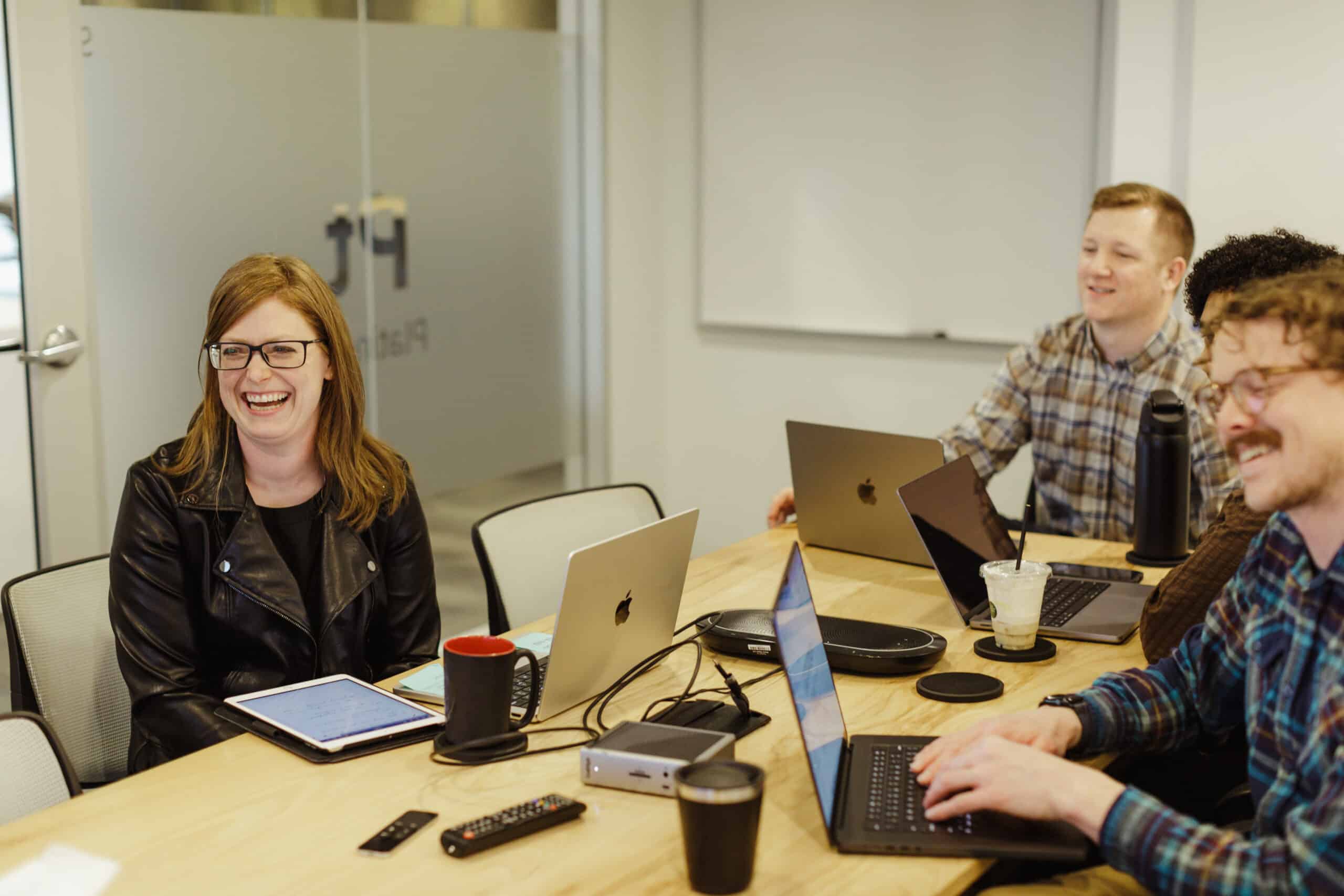 Author Jared Surato with coworkers. Post title: "Cheaper" Code Makes Creativity More Valuable