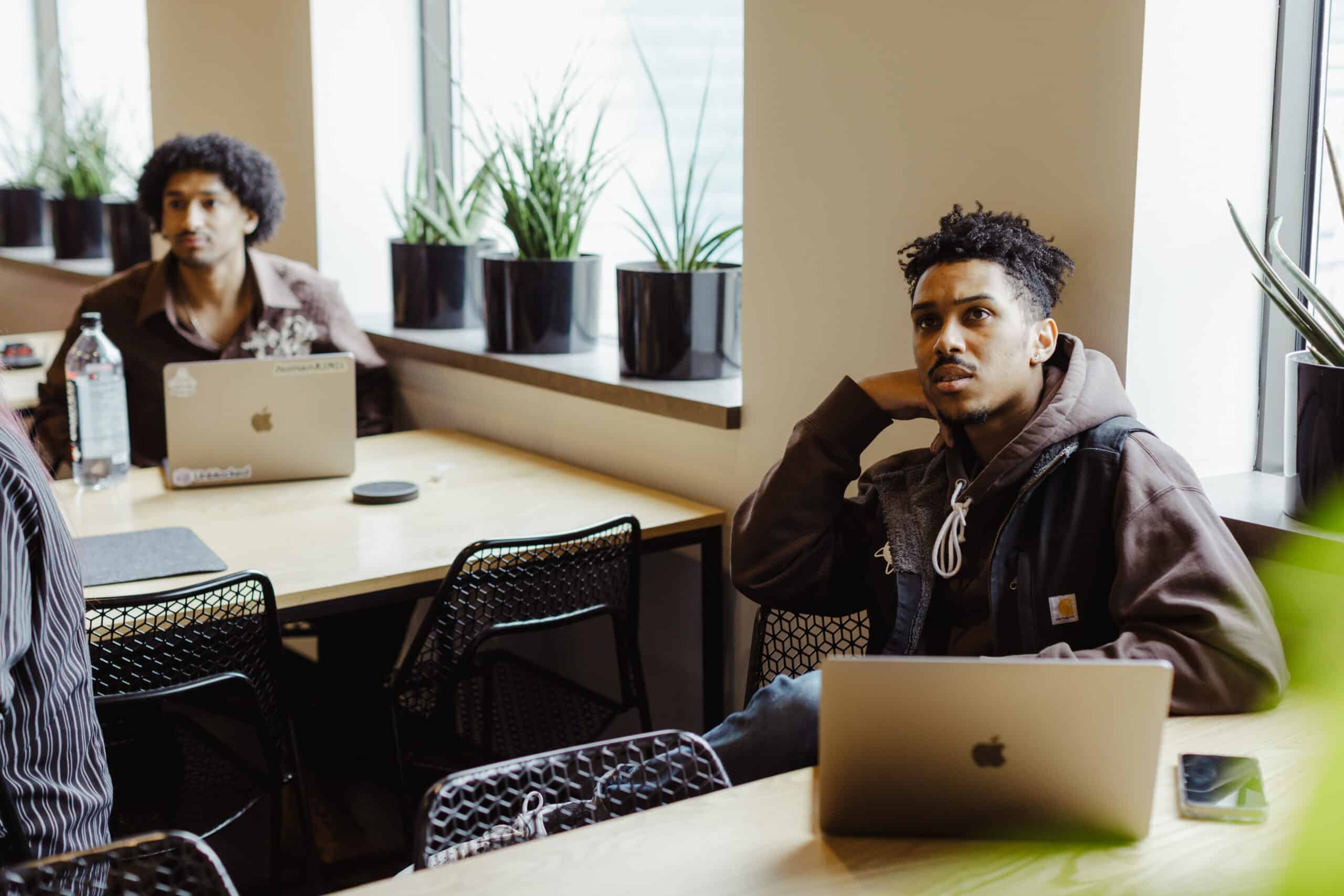 Shown is author Doug Shipp at the Atomic Object Ann Arbor office. Post title: How Aviator Eliminates the Pain of Stacked PRs
