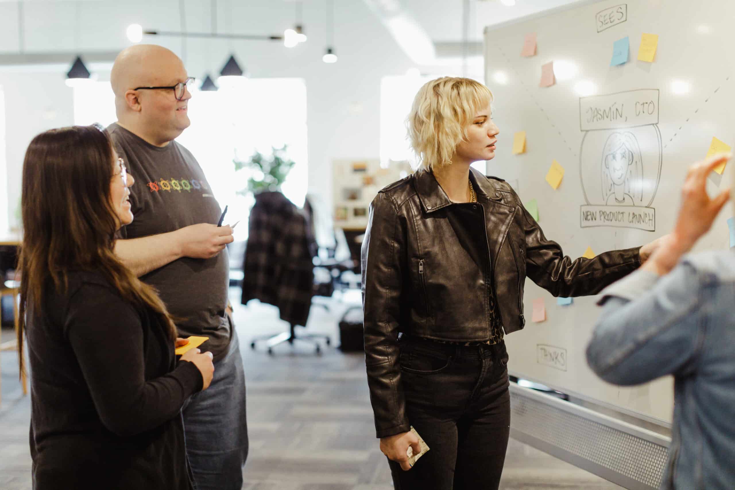 Pictured is author Rebecca Rayford at a whiteboard with co-workers. Post title: Use React Hook Forms with Zod Validation, Part Two: Using FormProvider