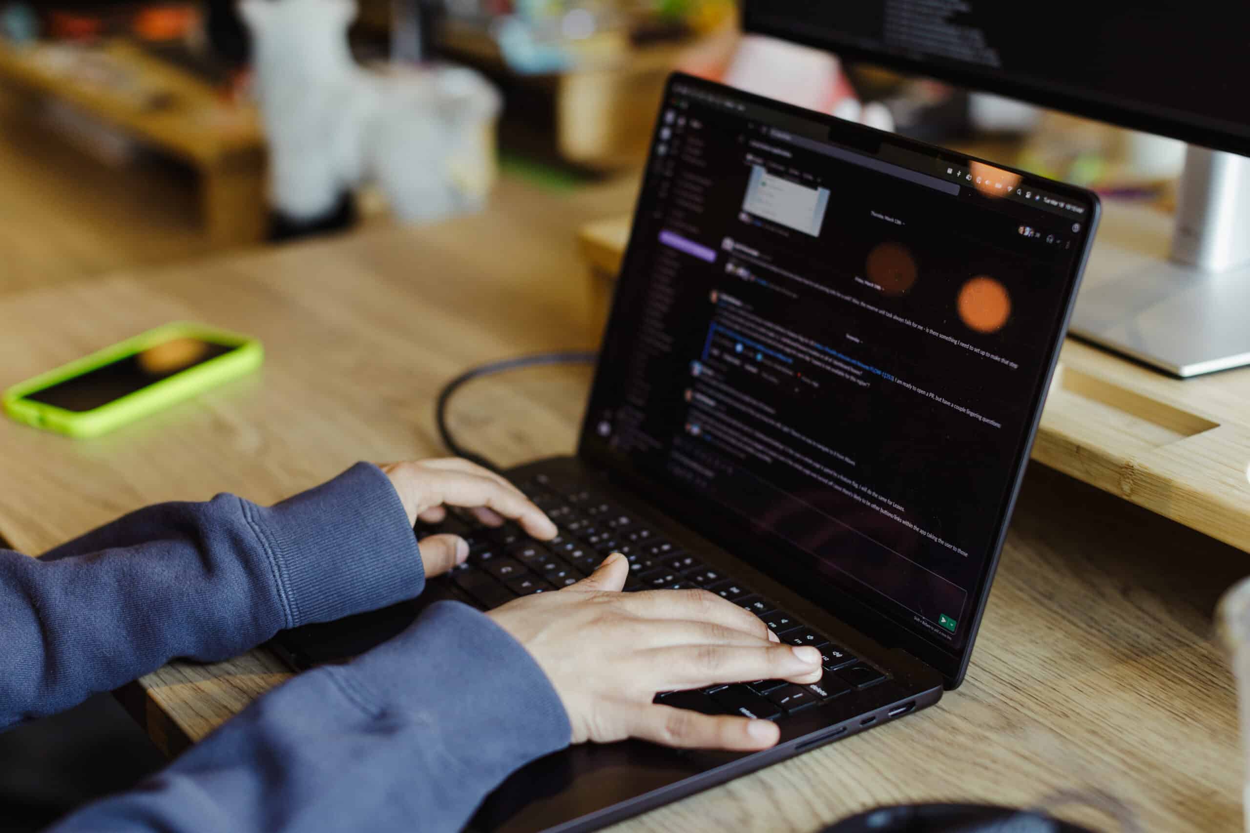 Developer's hands on a keyboard. Post title: Test GitHub Actions Locally with Act