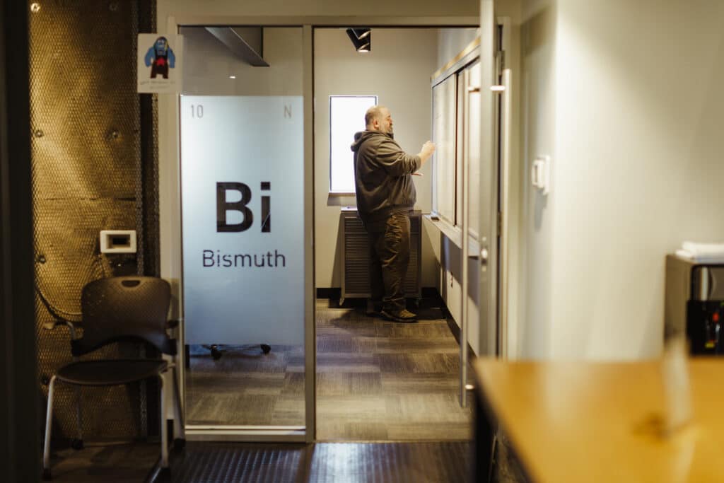 Shown is software developer and post author Rob Bell, at his Atomic Object Ann Arbor workstation. Post title: Introduction to Nushell: The Shell That Treats Everything as Data
