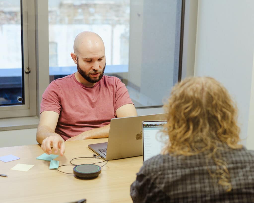 Shown is author Andrew Marmorstein. Post title: How Developer Rotations Promote Long-Term Project Success