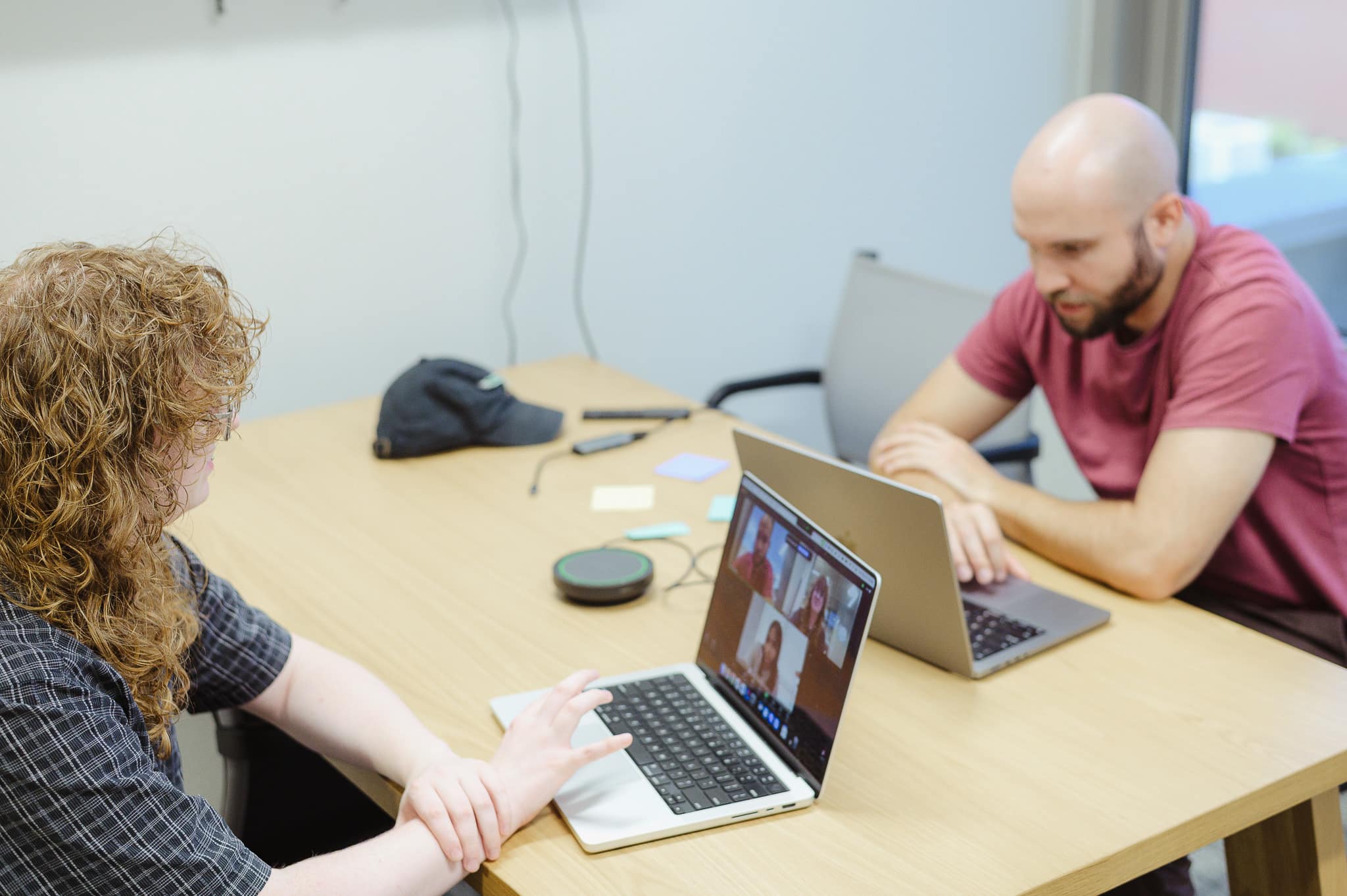 Pictured is author Andrew Marmorstein talking to a co-worker. Post title: Get the Most Out of Your Software Demo