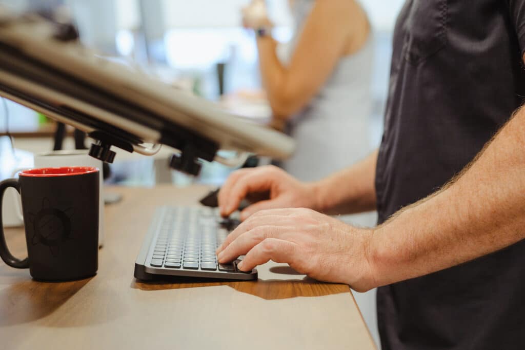 A developer's hands on a keyboard. Post title: Skills or Commands and How To Use Them