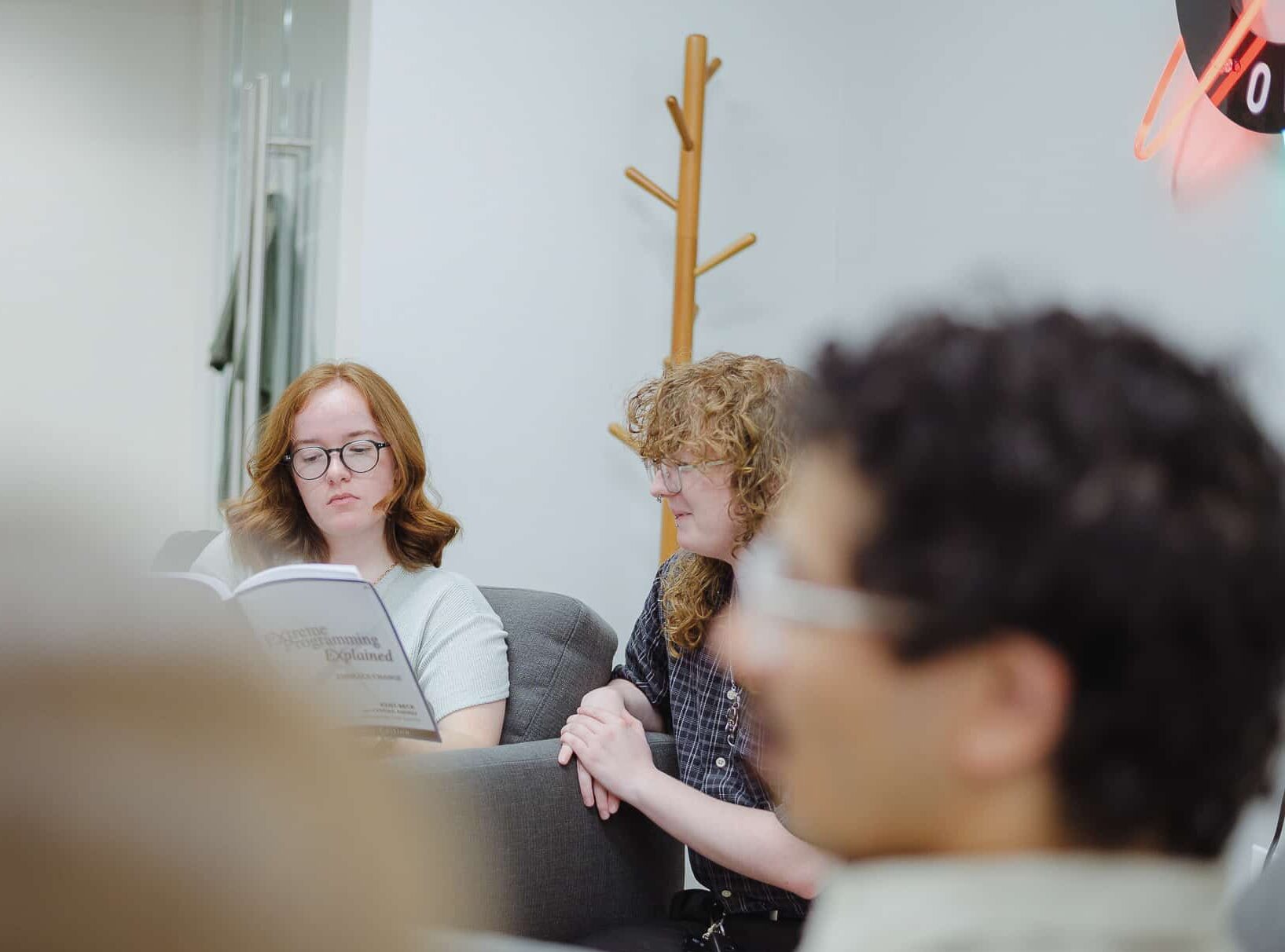 PIctured is author Ellie Jetton with co-workers. Post title: How to Connect Figma to Cursor Using the Figma MCP Server