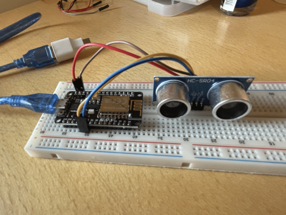 Breadboard with ultrasonic sensor and microcontroller