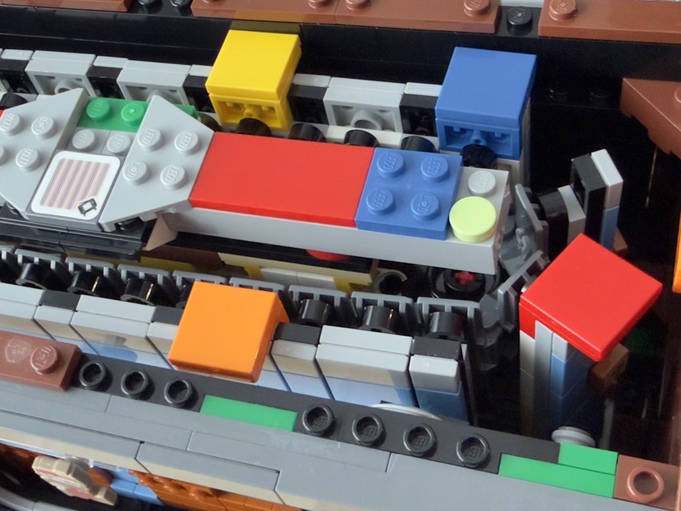 The top of the Super Mario Bros. scene, which wraps around and “scrolls” by moving. Colored tiles are mounted to the top that will trigger a Super Mario Bros. toy to make sounds going with the scene.