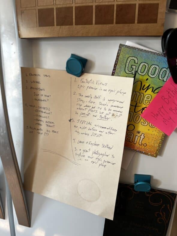 a photo of a piece of paper on the refrigerator with design principles written on it