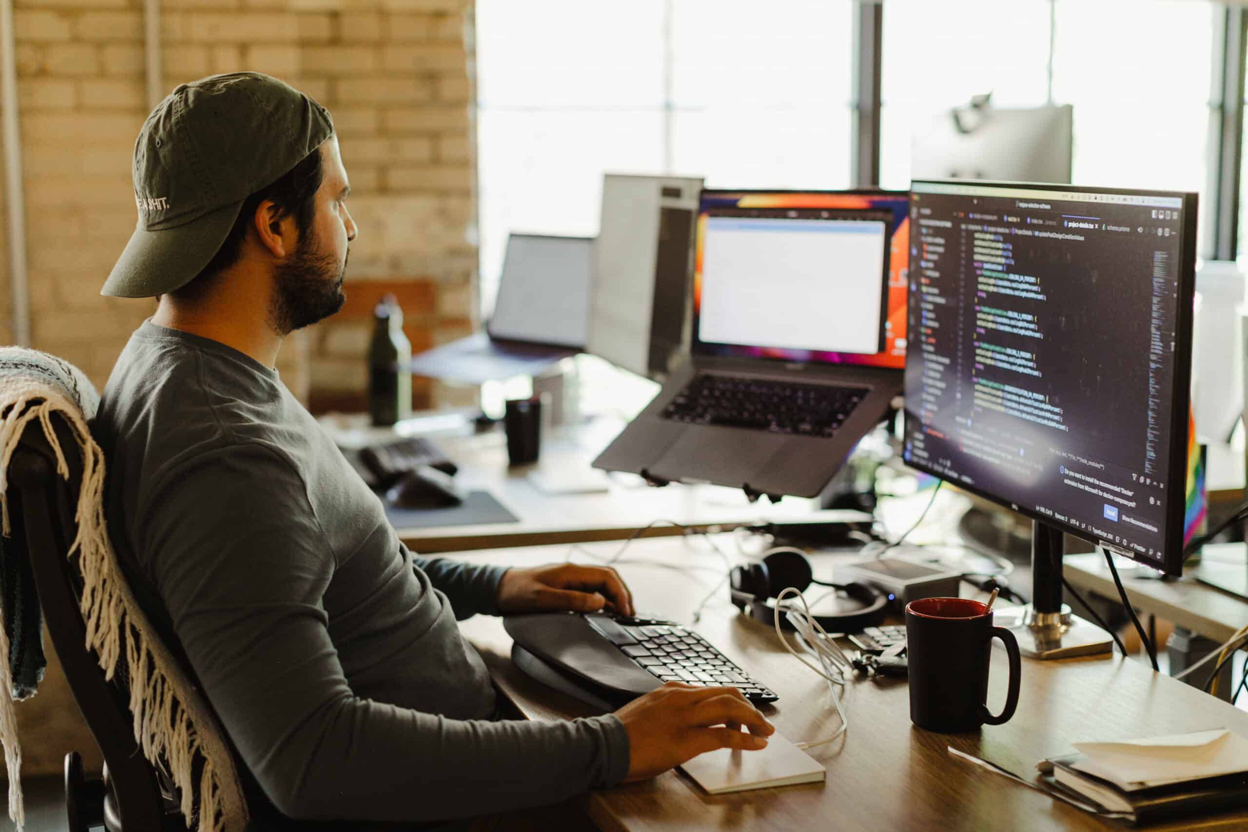 Pictured is author Ty Swanson at his computer. Post title: Advice for Consultants: Best Practices for Short Engagements