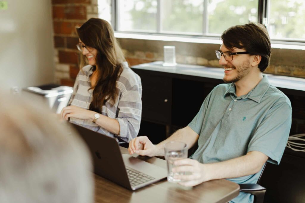Author Allen Janyska with a colleague. Post title: Reduce AI Decision Fatigue: Lessons from Game Design
