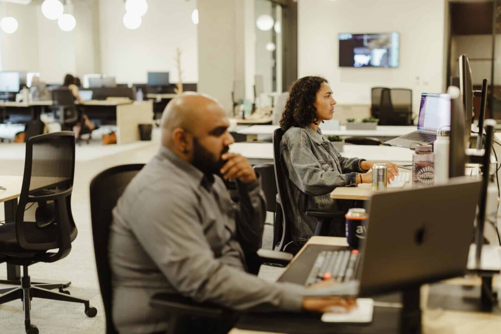 Author Pavan Policherla at his desk, thinking. Post title: The Velocity Trap: Why the Best Software Architects Move the Slowest
