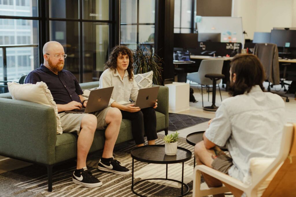 Author Bryan Paronto (L) with colleagues. Post title: Give a Modal Its Own URL in TanStack Router