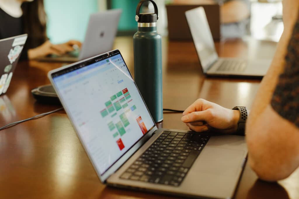 Hands on a laptop. Post title: Agentic Development: The Fun Part Was Never the Typing