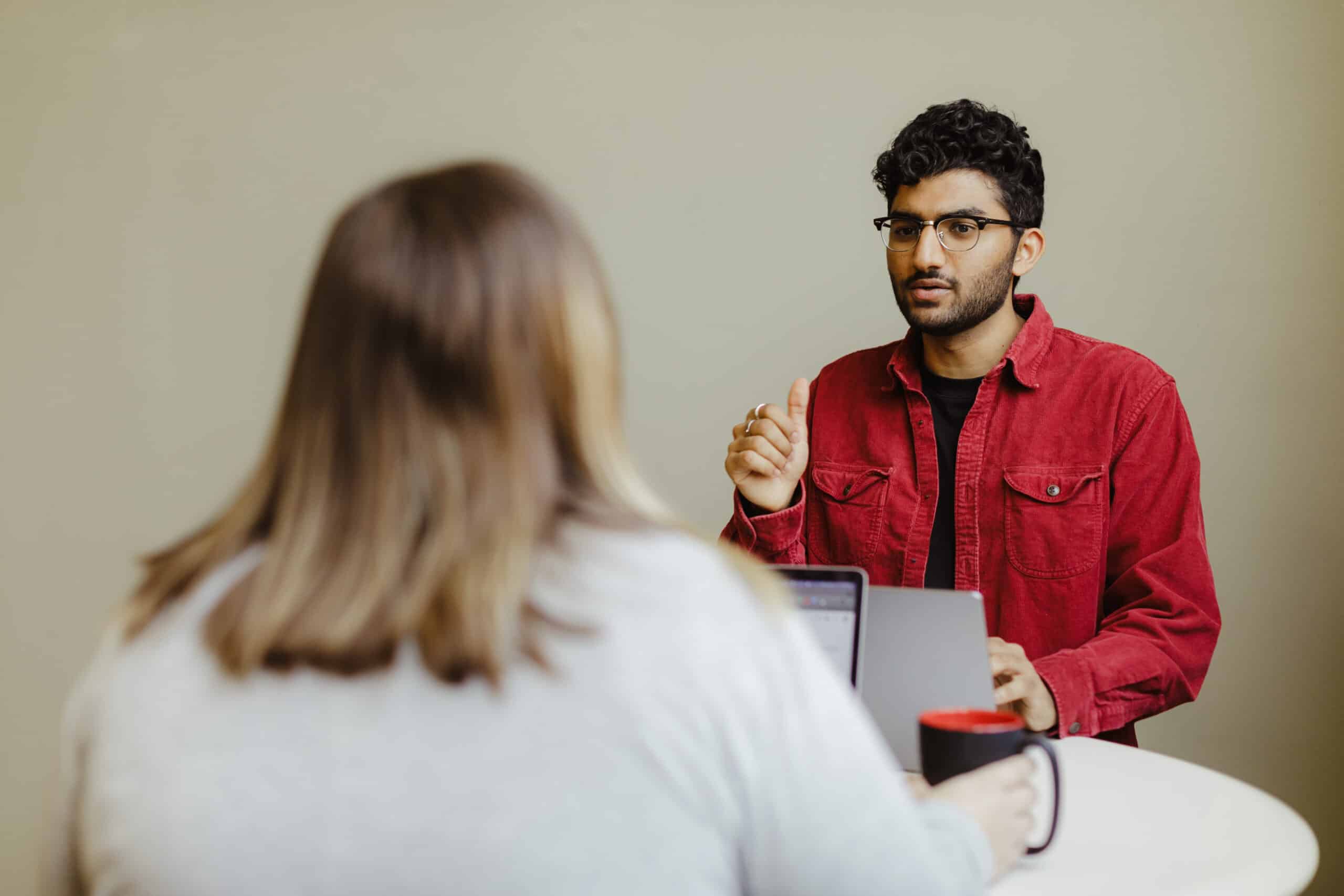 Author Sagar Rathod with a coworker. Post title: Graph-Style Queries vs. Joins: When Your REST API Hits a Wall