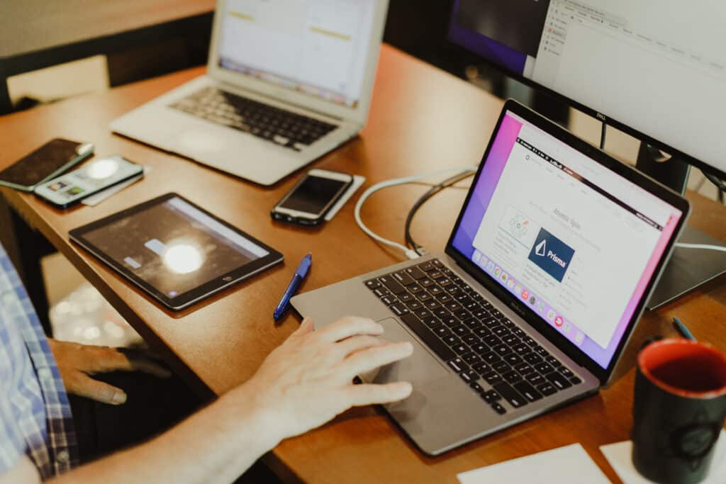 Shown are hands on a laptop. Post title: Here's How We Used Snapshot Tests for Software with Complex Data