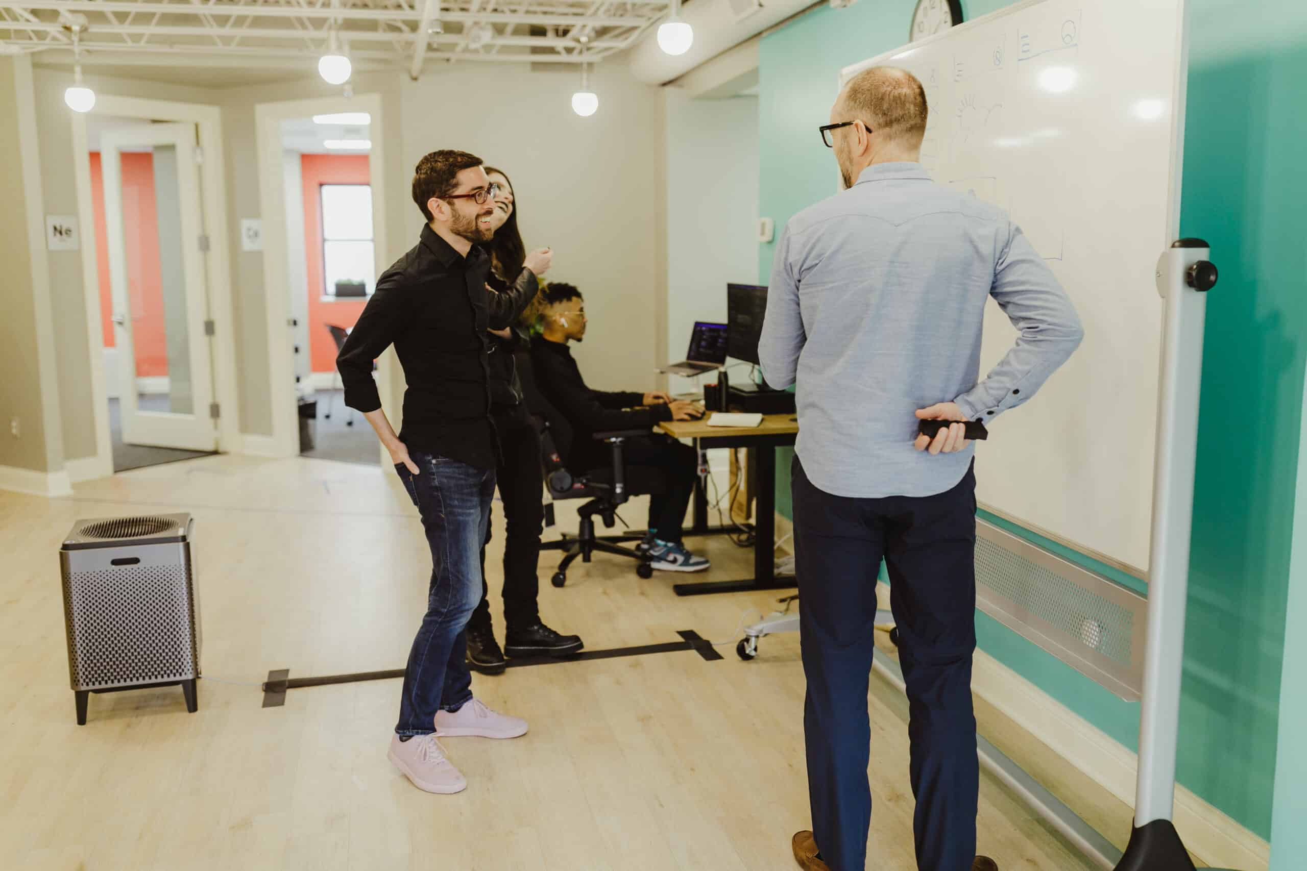 Don't be a hero; be a team - pictured is a software team working on a project