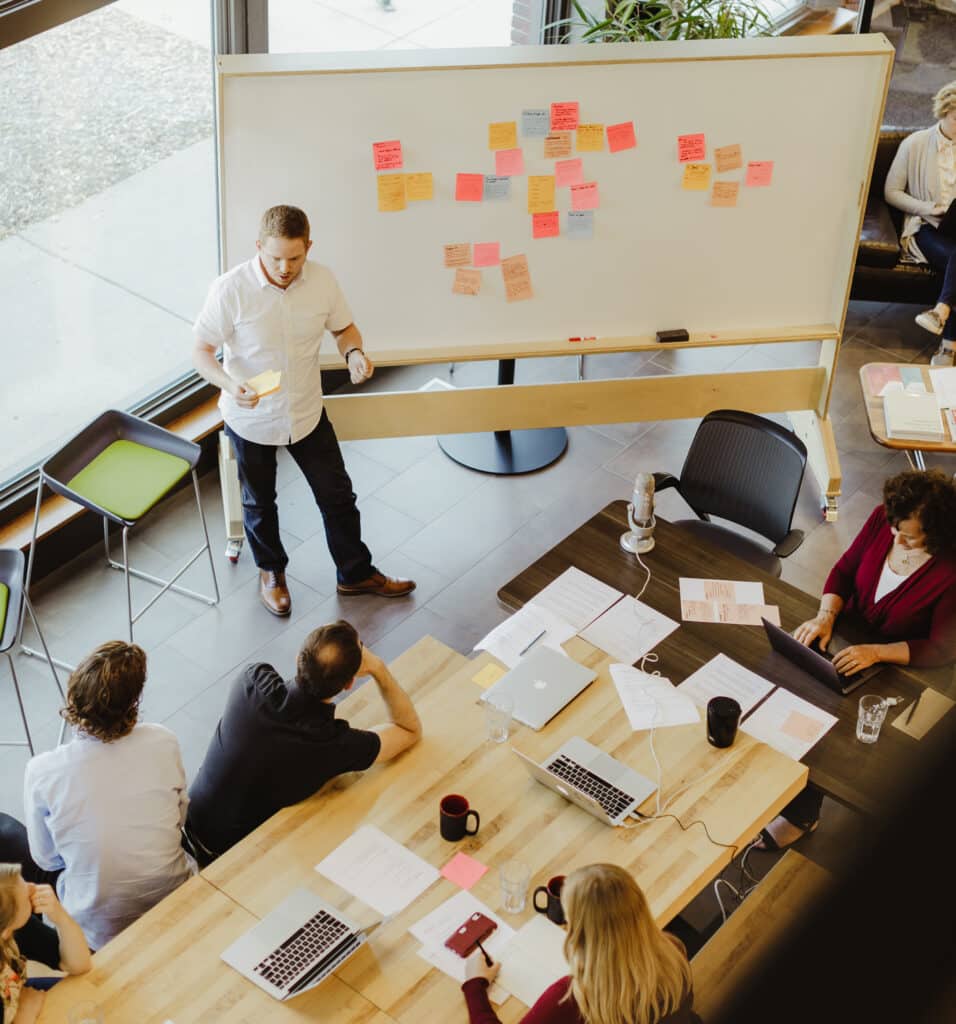 A team meeting at Atomic Object's Grand Rapids office illustrating "Software Engineering Is Not Dead"
