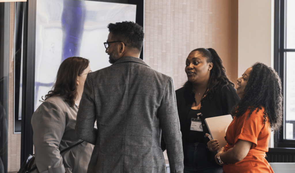 A networking event. Post title: What Predatory Media Pitches Reveal About Our Need for Real Community