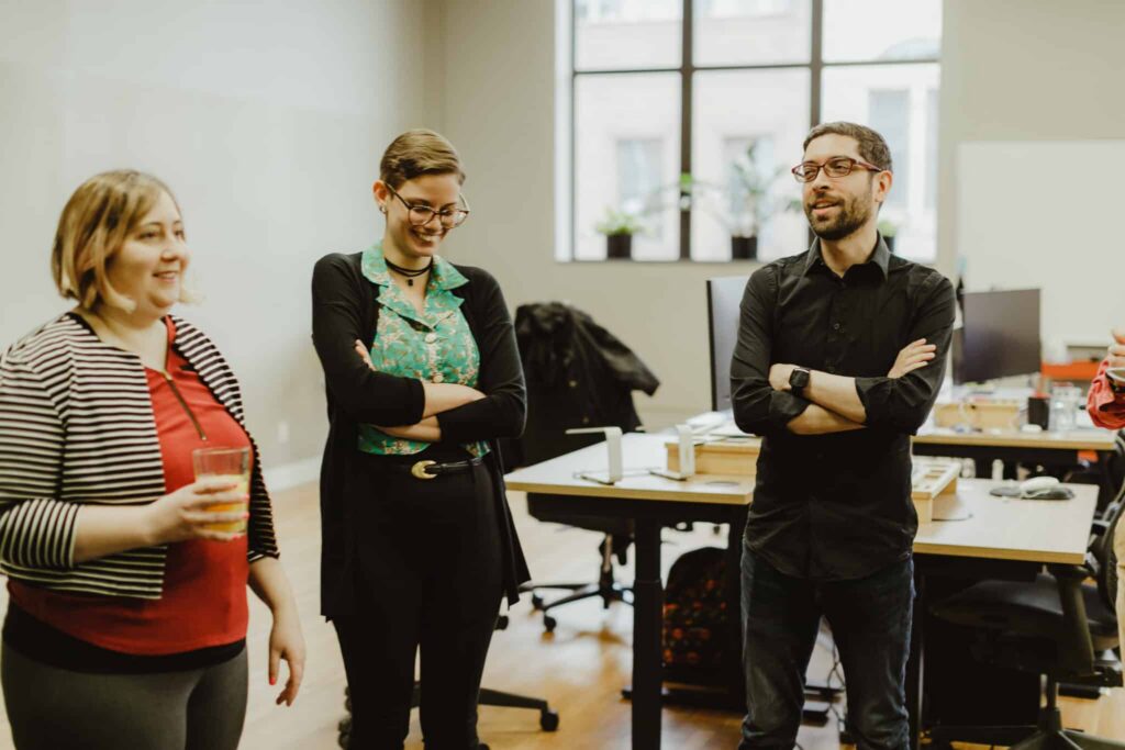 Author Matt Soto jokes with coworkers. Post title: Working in Kotlin: Waiting Around with Coroutines
