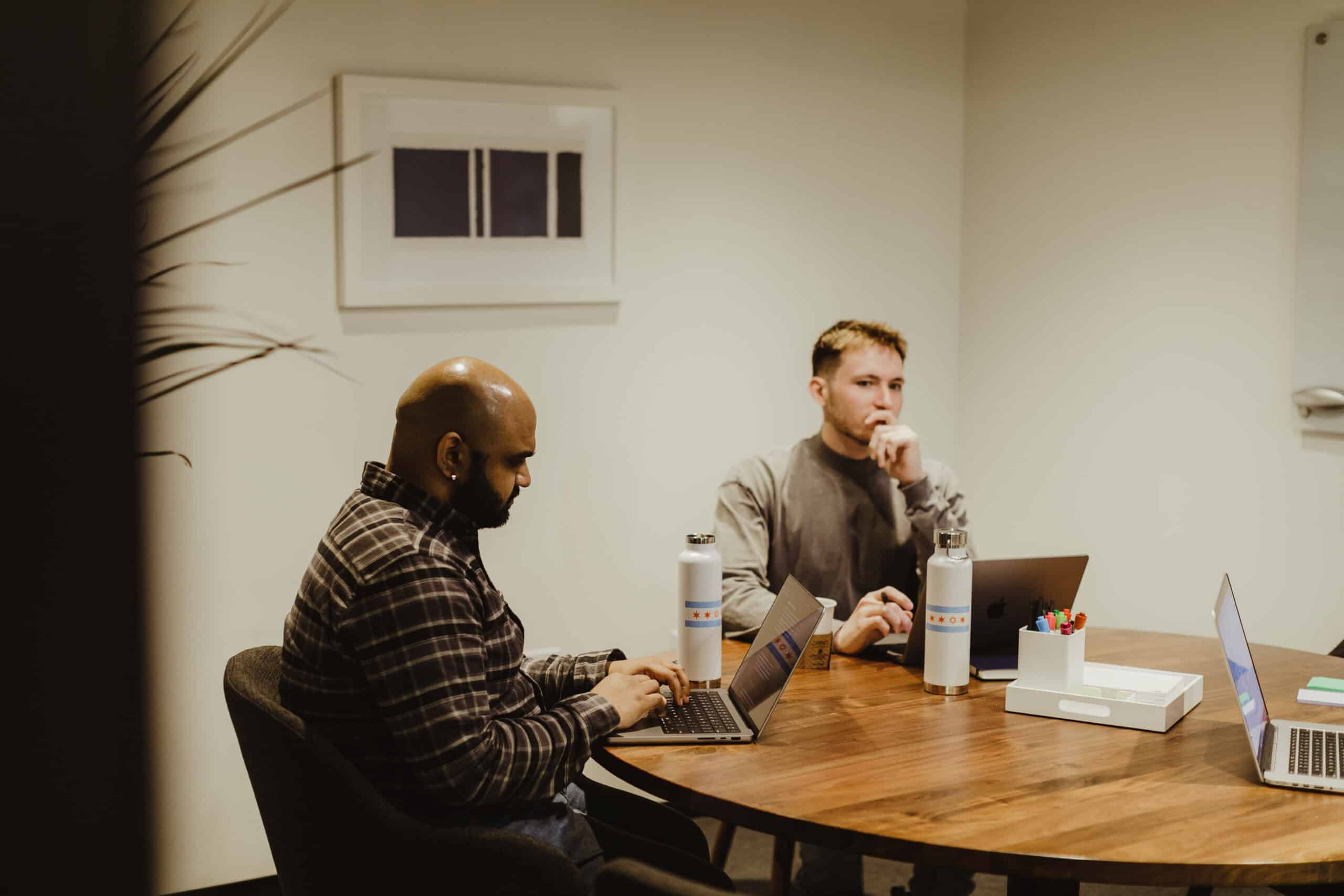 Pictured is author Pavan Policherla with a co-worker. Post title: Turn a Web Scraper Into a Content Parser Using AI